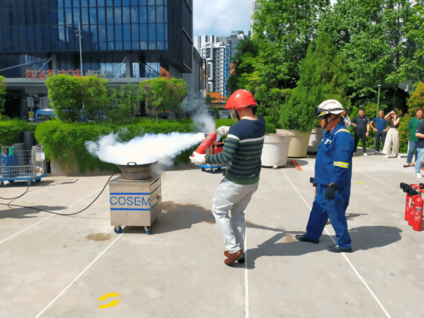 Fire safety demonstration during Health and Safety Day at Carlsberg Singapore.