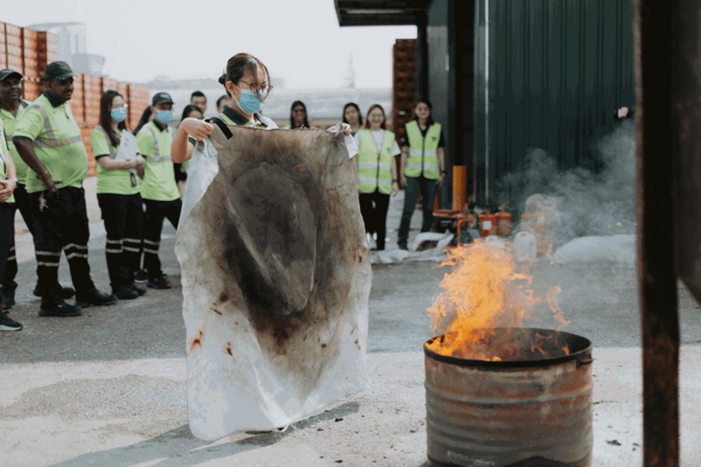 Fire safety demonstration during Health and Safety Day at Carlsberg Singapore.